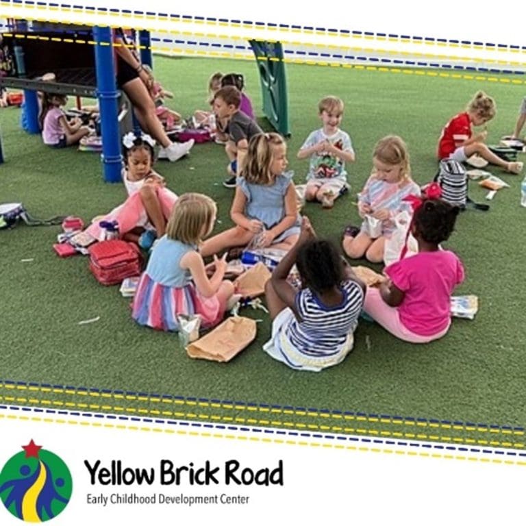 preschoolers playing on grass
